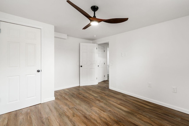 3944 Ardath Rd, Columbus, OH 43228 - unfurnished bedroom with wood finished floors, baseboards, and a ceiling fan