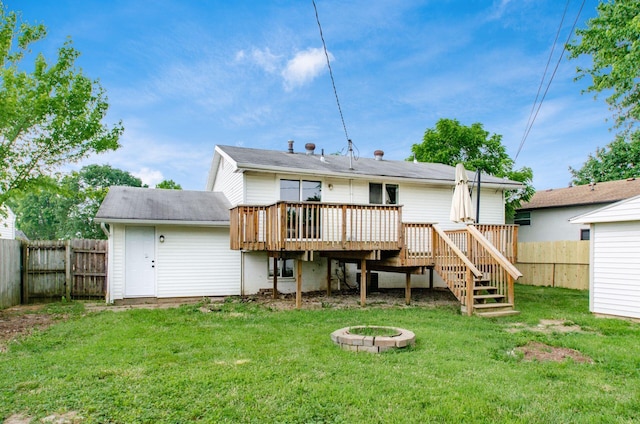 3944 Ardath Rd, Columbus, OH 43228 - back of property featuring a deck, stairs, a fire pit, and roof with shingles