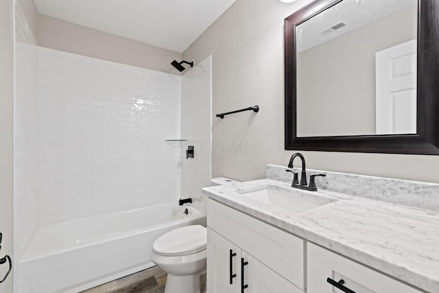 191 Saint Christopher Ln, Columbus, OH 43213 - full bath with toilet, vanity, wood finished floors, shower / tub combination, and a textured ceiling