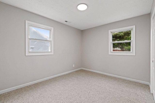 191 Saint Christopher Ln, Columbus, OH 43213 - carpeted empty room with baseboards
