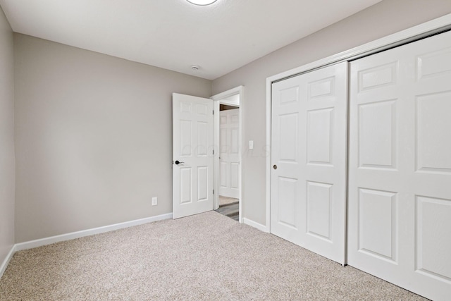 191 Saint Christopher Ln, Columbus, OH 43213 - unfurnished bedroom featuring carpet, baseboards, and a closet