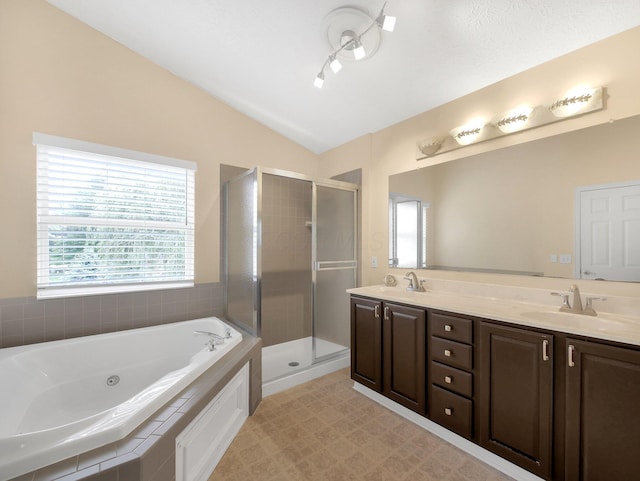 6048 Trent Ct, Lewis Center, OH 43035 - bathroom featuring healthy amount of natural light, lofted ceiling, a tub with jets, and a stall shower