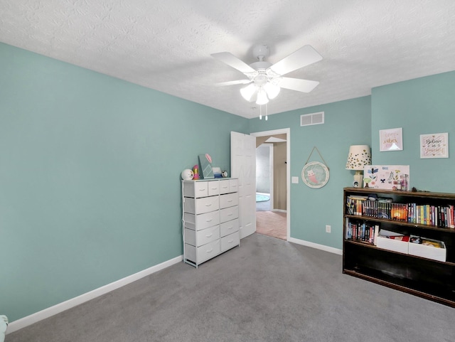 6048 Trent Ct, Lewis Center, OH 43035 - carpeted bedroom with baseboards, a textured ceiling, and a ceiling fan