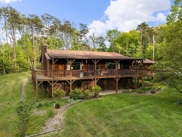 26975 Chapel Ridge Rd, South Bloomingville, OH 43152 - rear view of property with a deck, a chimney, a yard, and a patio area