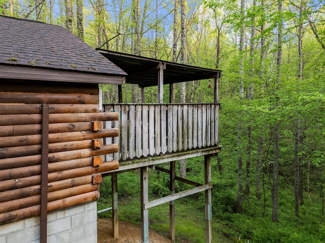 26975 Chapel Ridge Rd, South Bloomingville, OH 43152 - exterior view of a shingled roof and log exterior