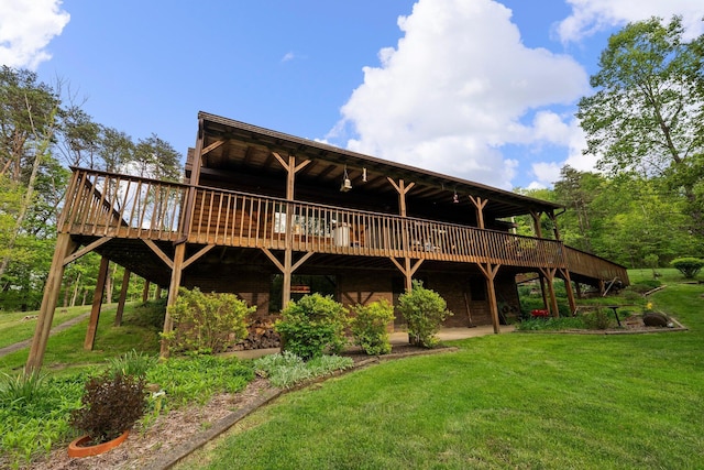 26975 Chapel Ridge Rd, South Bloomingville, OH 43152 - back of house with a wooden deck and a lawn