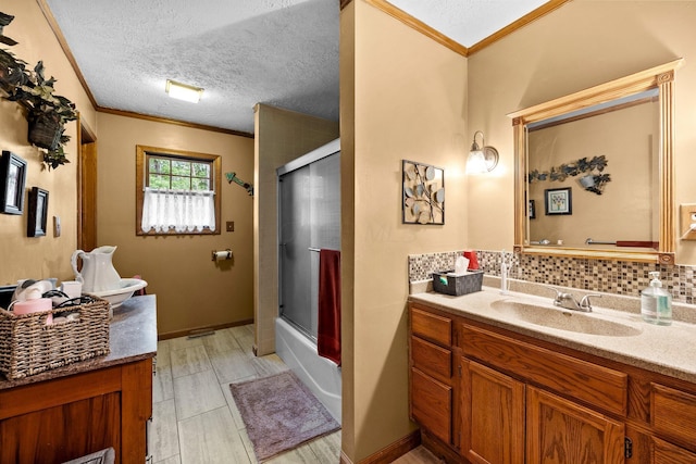 26975 Chapel Ridge Rd, South Bloomingville, OH 43152 - full bath featuring vanity, crown molding, bath / shower combo with glass door, and decorative backsplash