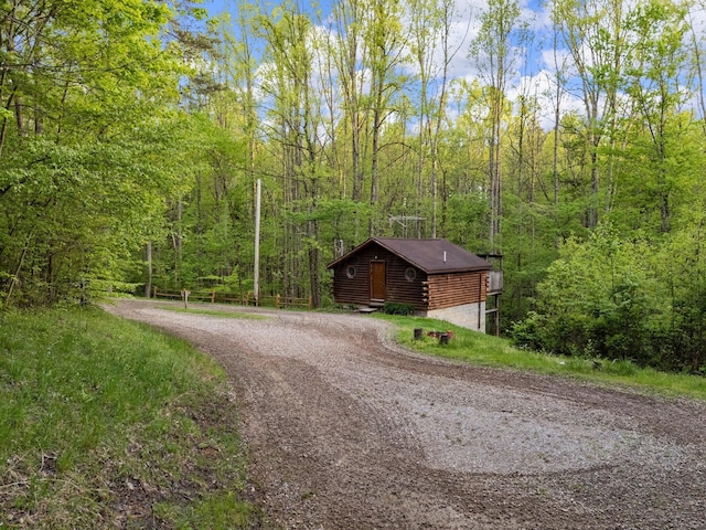 26975 Chapel Ridge Rd, South Bloomingville, OH 43152 - view of dirt / gravel driveway featuring a forest view