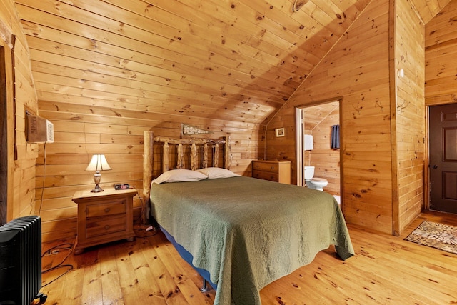 26975 Chapel Ridge Rd, South Bloomingville, OH 43152 - bedroom featuring light wood-style flooring, lofted ceiling, wood walls, connected bathroom, and radiator