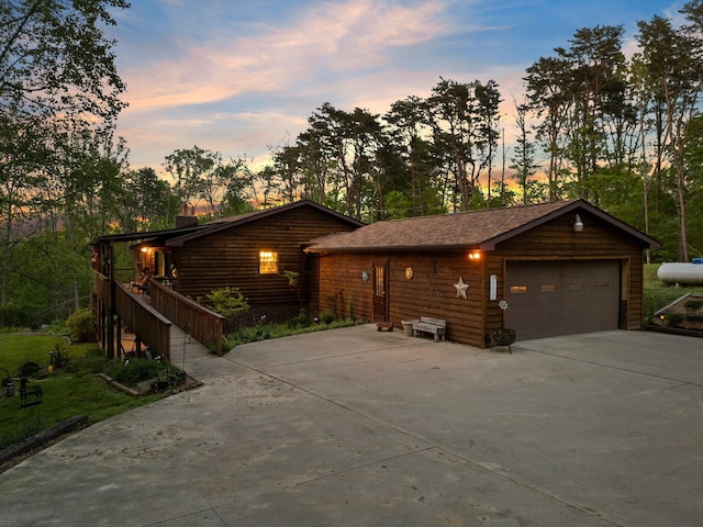 26975 Chapel Ridge Rd, South Bloomingville, OH 43152 - chalet / cabin with a detached garage, a chimney, and an outbuilding