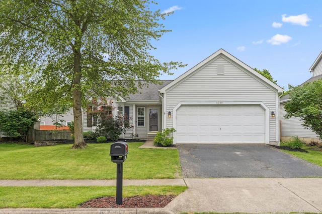 6389 Riverstone Dr, Columbus, OH 43228 - view of front of house featuring asphalt driveway and a garage