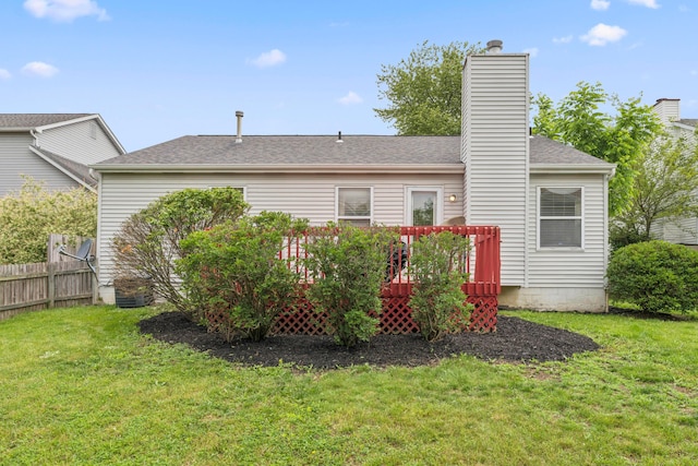 6389 Riverstone Dr, Columbus, OH 43228 - rear view of house featuring a deck, a chimney, and roof with shingles