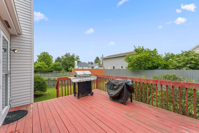 6389 Riverstone Dr, Columbus, OH 43228 - deck with a fenced backyard and grilling area