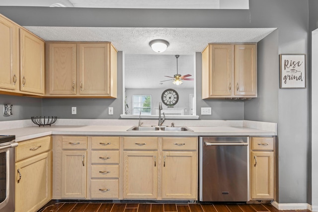 6389 Riverstone Dr, Columbus, OH 43228 - kitchen with dishwasher, a sink, light brown cabinetry, and a textured ceiling