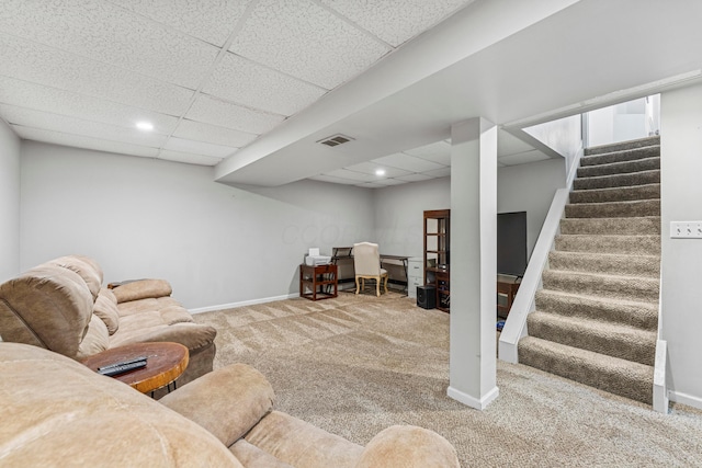 6389 Riverstone Dr, Columbus, OH 43228 - carpeted living room featuring stairway, recessed lighting, a drop ceiling, and baseboards