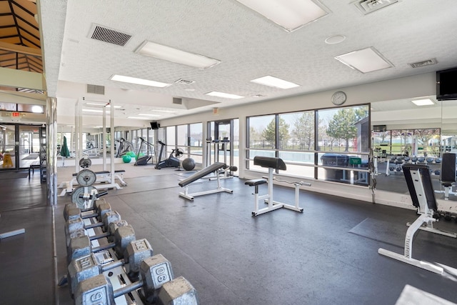 4655 Parrau Dr Unit 66A, Columbus, OH 43228 - gym with a textured ceiling