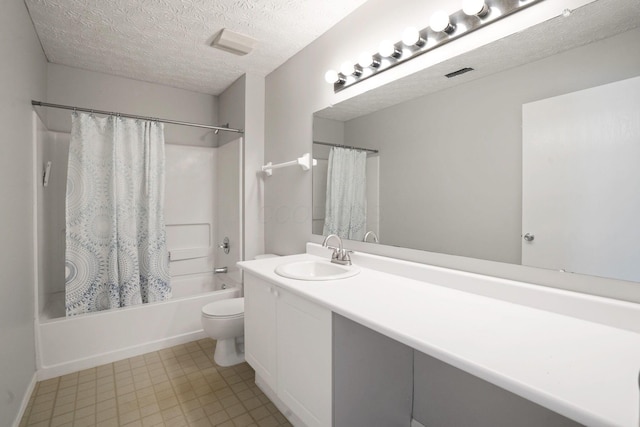 4655 Parrau Dr Unit 66A, Columbus, OH 43228 - full bath with vanity, toilet, shower / tub combo with curtain, and a textured ceiling