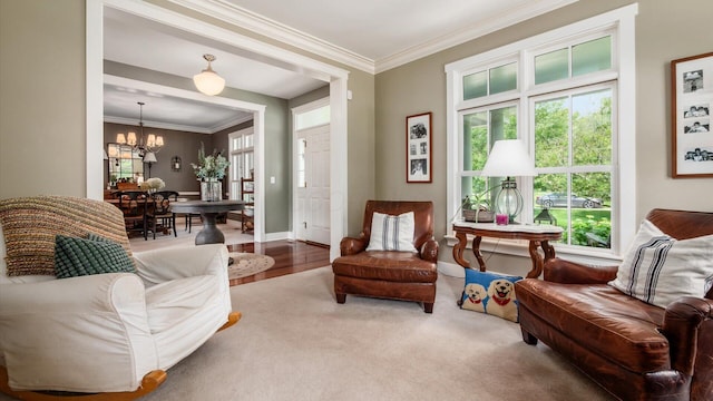 122 Boulder Ct, Granville, OH 43023 - sitting room with a chandelier, crown molding, carpet flooring, and baseboards