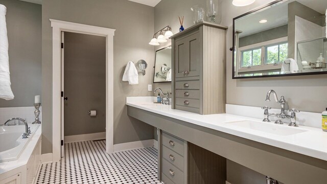122 Boulder Ct, Granville, OH 43023 - bathroom with a sink, a garden tub, baseboards, and a shower