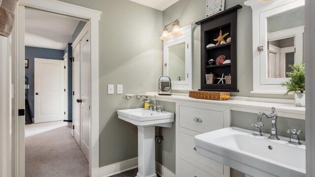 122 Boulder Ct, Granville, OH 43023 - bathroom featuring a sink and baseboards