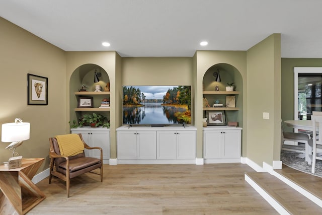 29 Pocono Rd, Columbus, OH 43235 - living area featuring light wood finished floors, built in features, baseboards, and recessed lighting