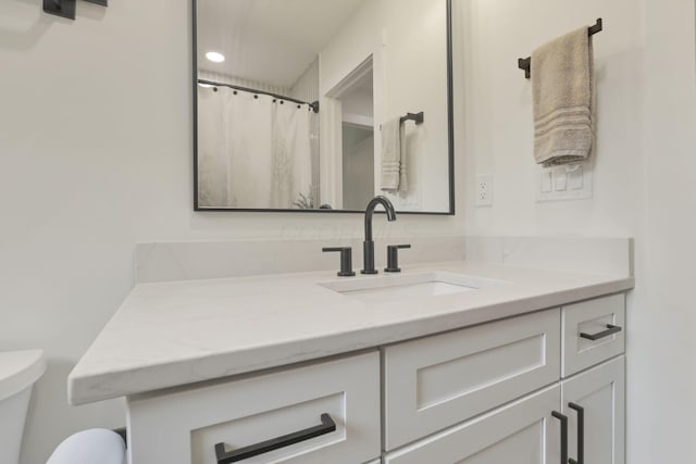 29 Pocono Rd, Columbus, OH 43235 - bathroom with toilet, vanity, and recessed lighting