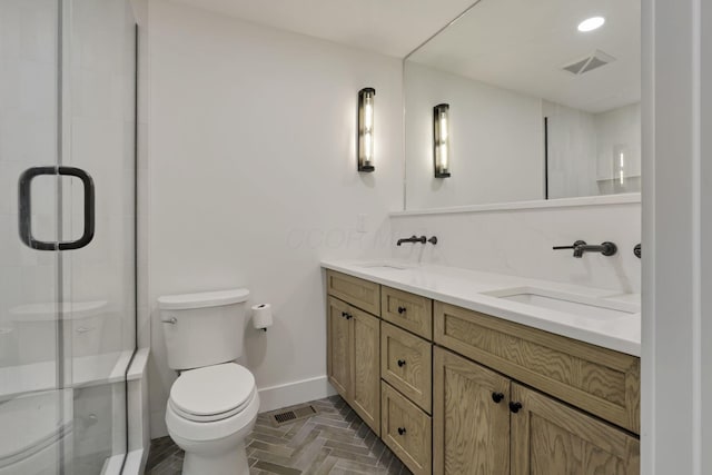 29 Pocono Rd, Columbus, OH 43235 - bathroom with double vanity, toilet, a shower stall, and baseboards