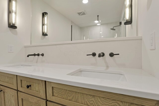 29 Pocono Rd, Columbus, OH 43235 - full bathroom with double vanity and a walk in shower