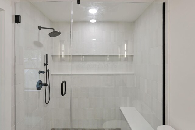 29 Pocono Rd, Columbus, OH 43235 - full bathroom featuring toilet and a shower stall