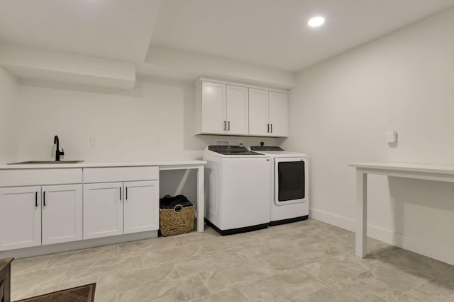 29 Pocono Rd, Columbus, OH 43235 - washroom featuring washing machine and clothes dryer, cabinet space, recessed lighting, and baseboards