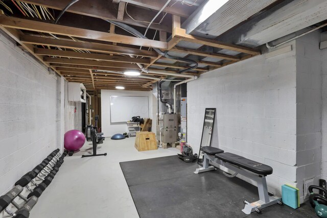 29 Pocono Rd, Columbus, OH 43235 - workout room with heating unit and concrete block wall