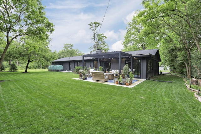 29 Pocono Rd, Columbus, OH 43235 - back of property featuring an outdoor living space, a patio, a chimney, and a yard