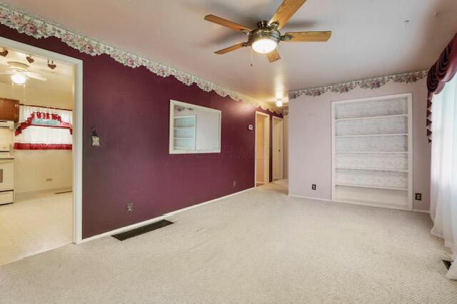 1270 Wetsell Ave, Lancaster, OH 43130 - carpeted spare room with a ceiling fan