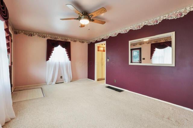 1270 Wetsell Ave, Lancaster, OH 43130 - carpeted spare room featuring a ceiling fan and baseboards