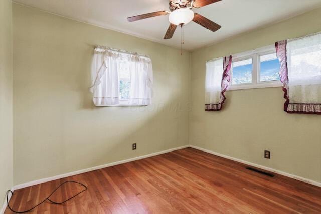 1270 Wetsell Ave, Lancaster, OH 43130 - unfurnished room featuring wood finished floors, baseboards, and ceiling fan