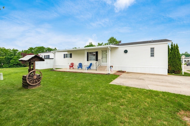 2389 Bluff Run Dr, Grove City, OH 43123 - back of house featuring a patio area, a lawn, and entry steps