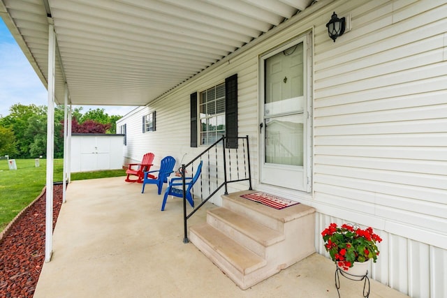 2389 Bluff Run Dr, Grove City, OH 43123 - view of exterior entry with a yard and a patio