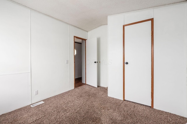 2389 Bluff Run Dr, Grove City, OH 43123 - unfurnished bedroom featuring carpet and a textured ceiling