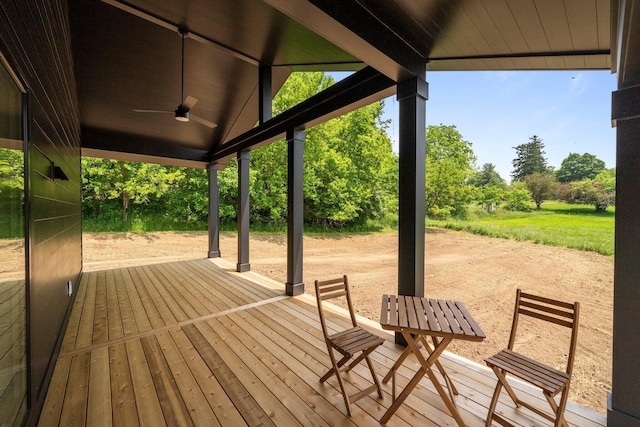 7931 Concord Rd, Johnstown, OH 43031 - wooden terrace with a ceiling fan and view of scattered trees
