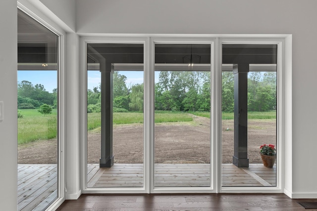 7931 Concord Rd, Johnstown, OH 43031 - doorway to outside featuring plenty of natural light and dark wood-style flooring