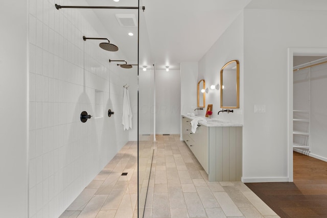 7931 Concord Rd, Johnstown, OH 43031 - full bathroom featuring a walk in shower, double vanity, and a walk in closet