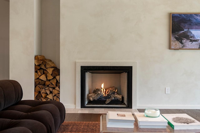 7931 Concord Rd, Johnstown, OH 43031 - detailed view of a lit fireplace and wood finished floors