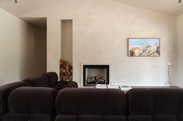 7931 Concord Rd, Johnstown, OH 43031 - living room featuring vaulted ceiling and a fireplace with raised hearth