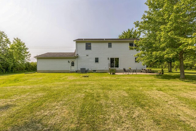 5971 Weaver Rd, Conneaut, OH 44030 - back of house with a patio, a lawn, and central AC unit