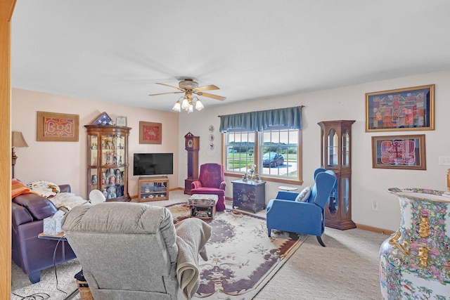 5971 Weaver Rd, Conneaut, OH 44030 - living room with light colored carpet, ceiling fan, and baseboards