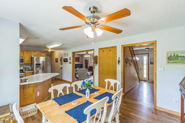 5971 Weaver Rd, Conneaut, OH 44030 - dining space featuring ceiling fan, light wood-style floors, and baseboards
