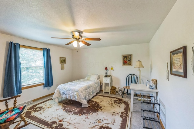 5971 Weaver Rd, Conneaut, OH 44030 - bedroom with a textured ceiling, a ceiling fan, baseboards, and carpet