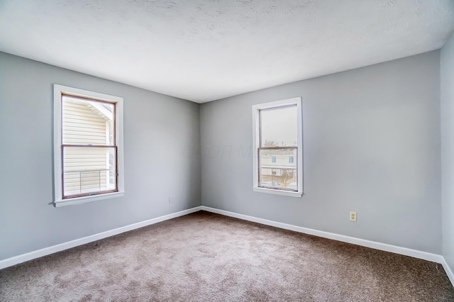 1011 Mcclelland Ave, Columbus, OH 43211 - spare room with carpet flooring and baseboards