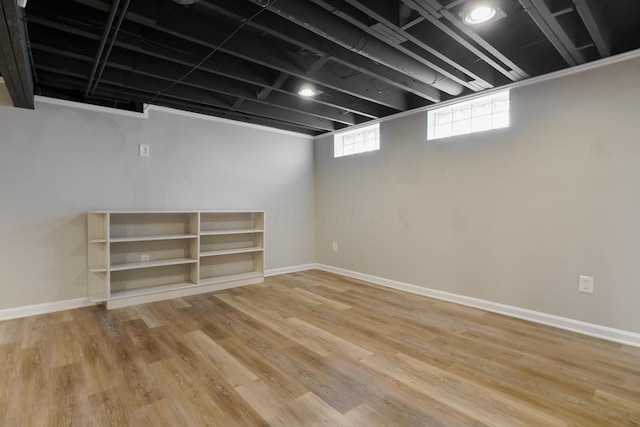 966 Chambers Cir, Columbus, OH 43212 - basement featuring wood finished floors and baseboards