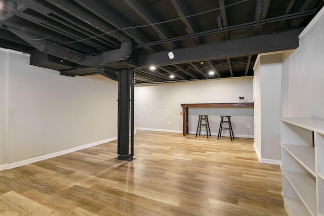 966 Chambers Cir, Columbus, OH 43212 - finished basement featuring wood finished floors and baseboards
